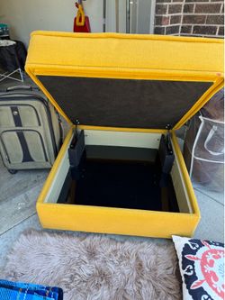 Yellow vintage ottoman with storage
