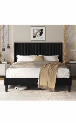 Black upholstered king bed