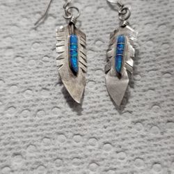 925 Real  Silver Feather earrings with the perfect touch of turquoise. Handmade