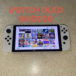 NINTENDO SWITCH OLED + 100 SWITCH GAMES