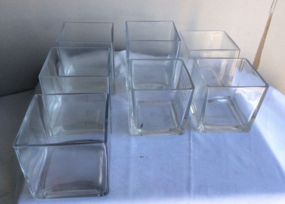 Glass containers for votives or succulent garden