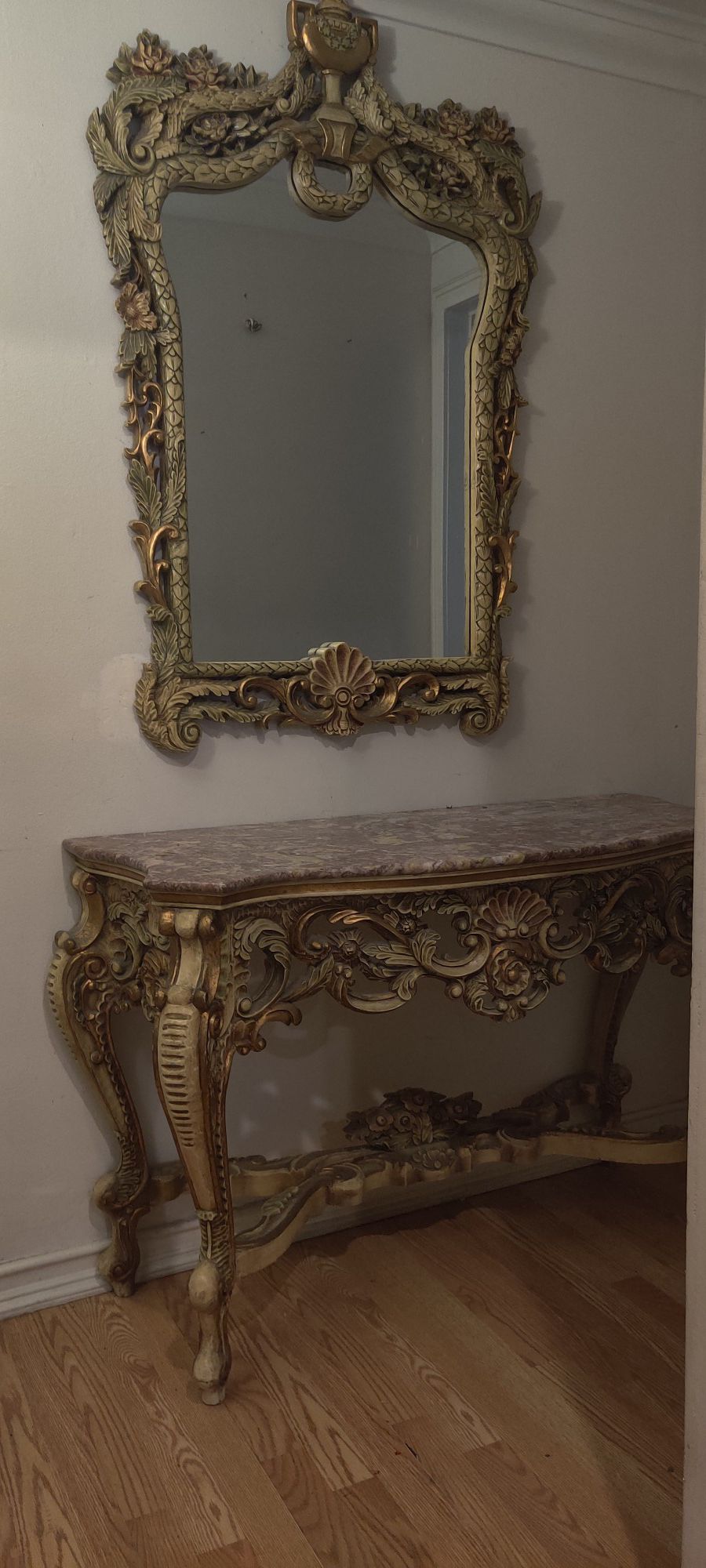 Table color: gold with marble for top comes with mirror. Beautiful designs