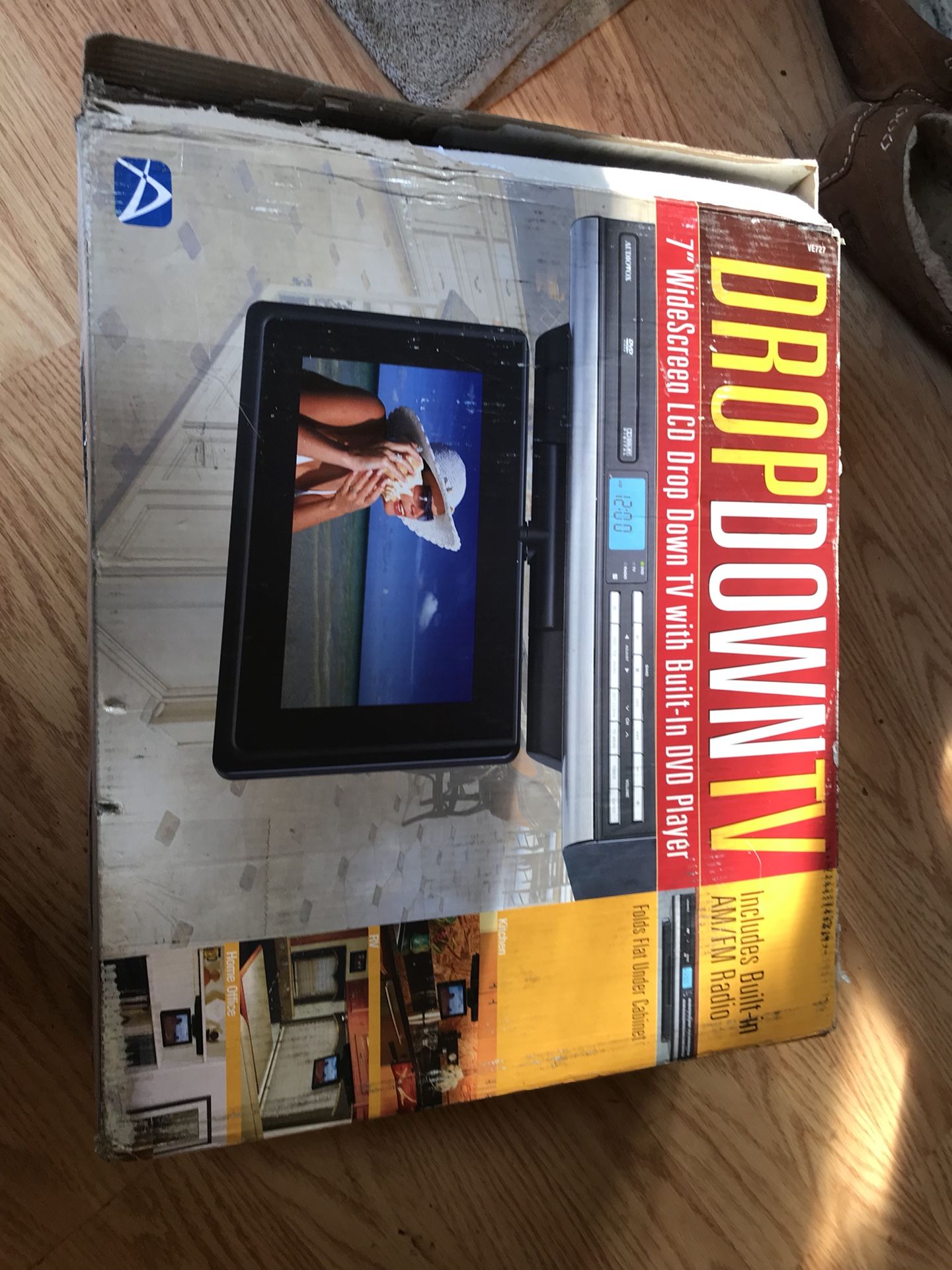 Brand New Audiovox Drop Down 7” LCD TV/DVD Player