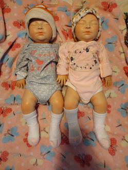 2 full body sillicone baby girl dolls   about 20 inches tall each