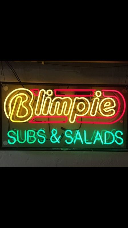 Large neon Blimpie sub sign