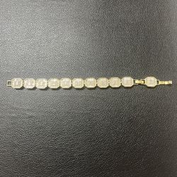 14k gold plated woman’s bracelet.