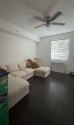 White Modular Sectional Sofa with Ottoman