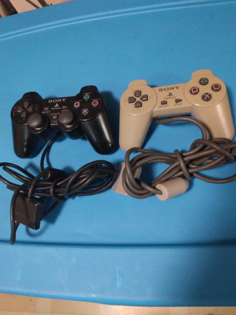 2 VINTAGE SONY PLAYSTATION CONTROLLERS
