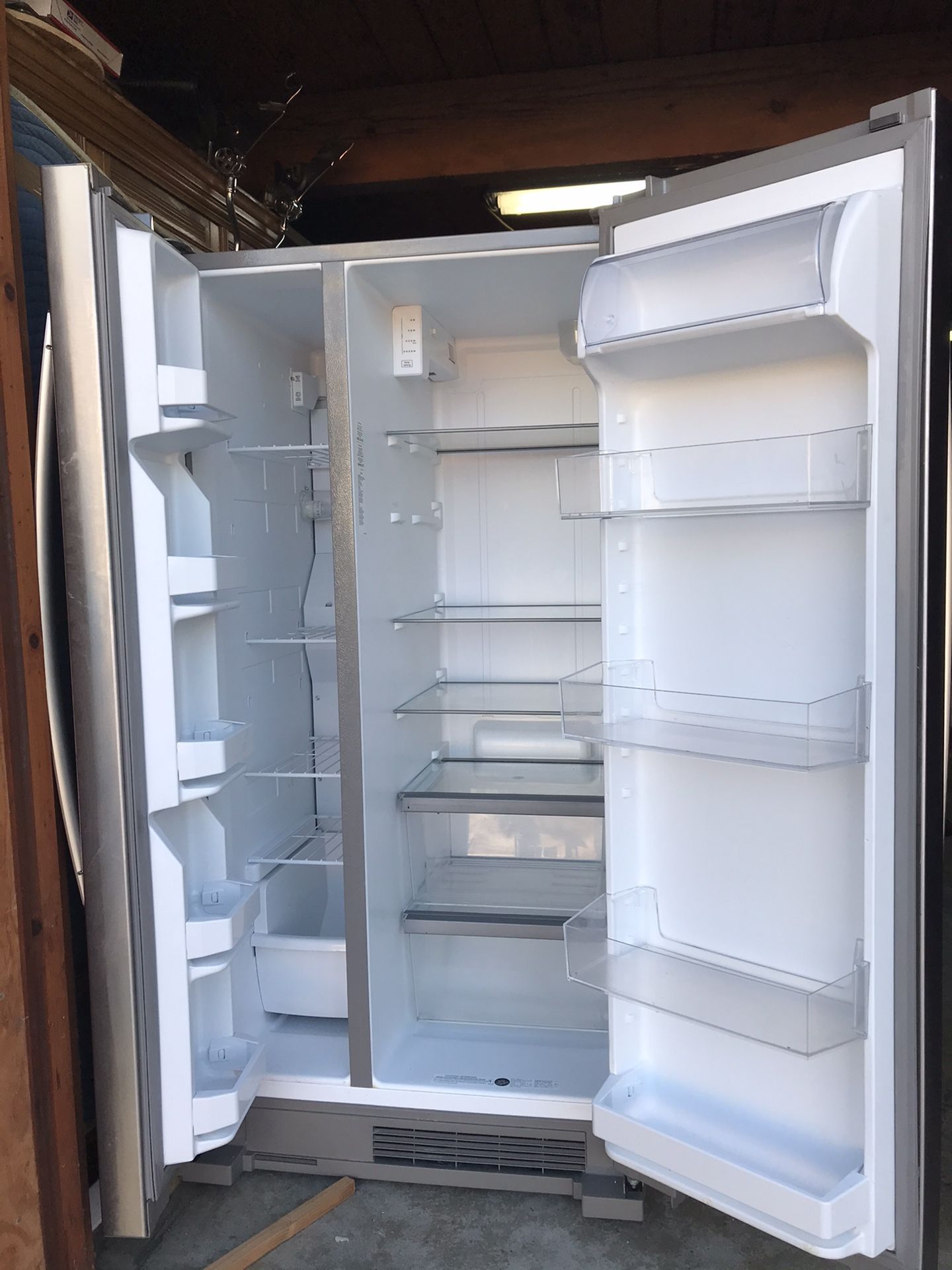 Whirlpool Refrigerator Side by Side Stainless Steel About A Year And A Half New. Too Big For The Area In Our Kitchen. No Icemaker Model.