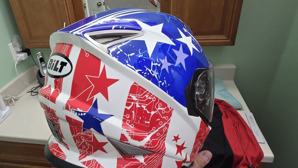 SIZE M BILT AMERICAN FLAG HELMET WITH DROP DOWN SUN VISOR