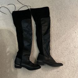 Over the knee black boots