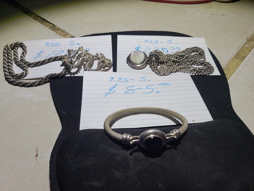 Silver Necklaces And Bracelet