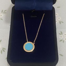 Tiffany & Co. Necklace With White Diamonds Surrounding A Blue Sapphire 