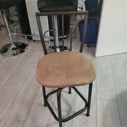 Two Leather  Swivel Table Chairs 