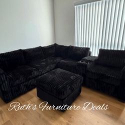 Stylish Black Sectional Sofa W/Ottoman And Cup Holders