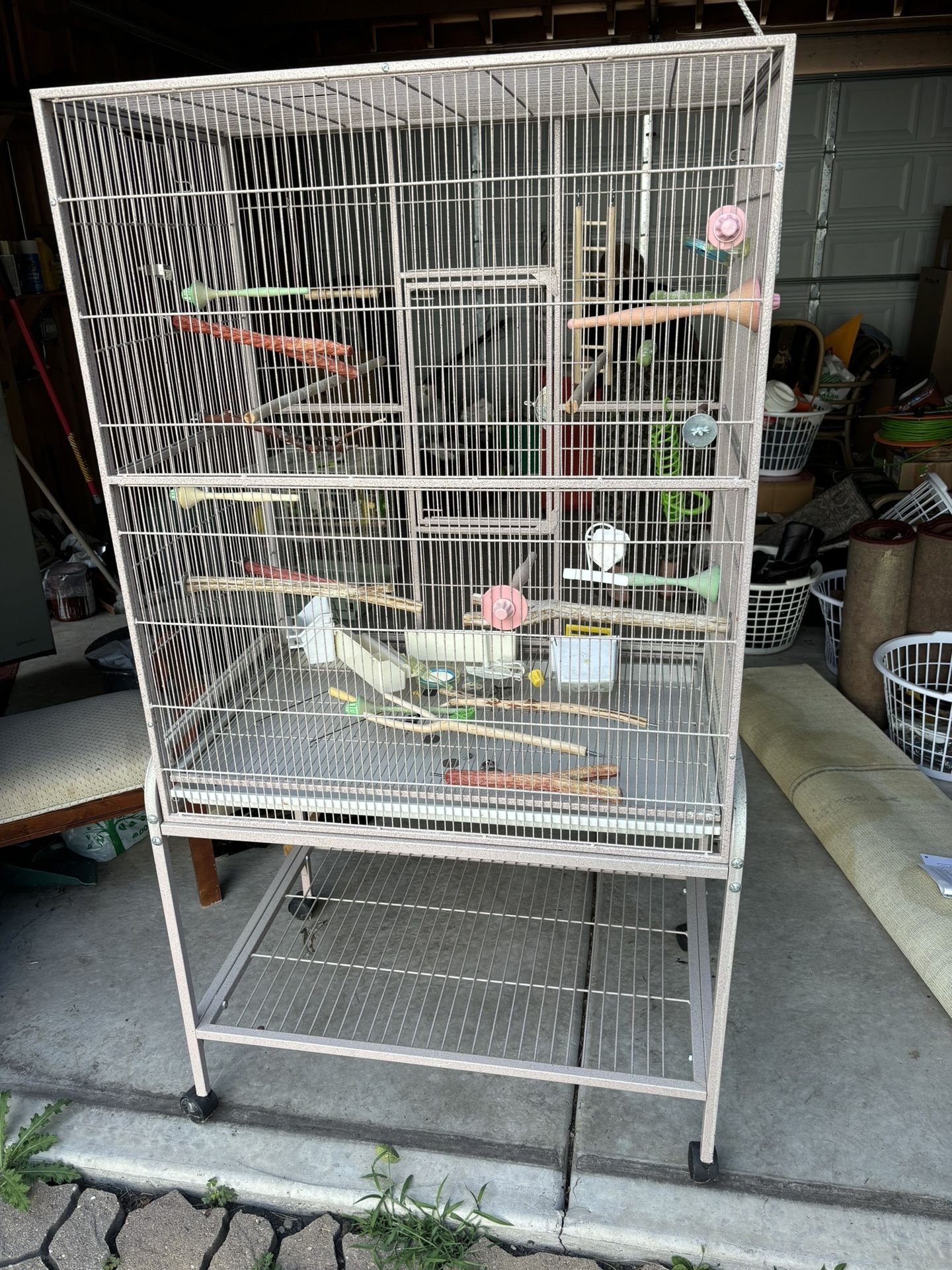 Bird cage with attachments