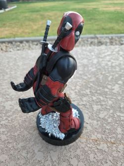 Deadpool cell or remote holder