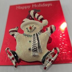 Vintage christmas snowman ice skating pin