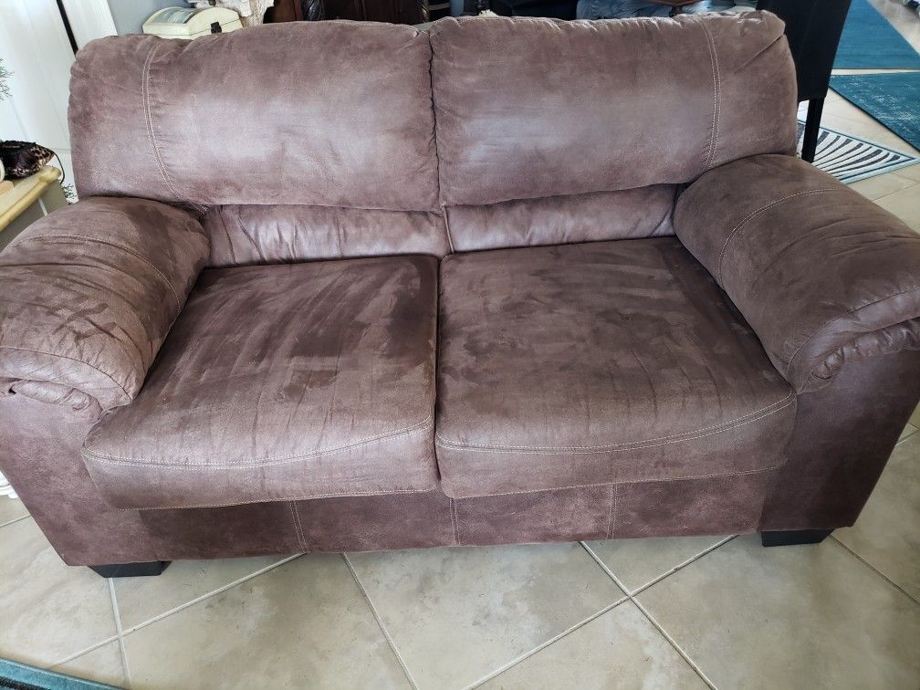 Ashley Faulk Leather Loveseat