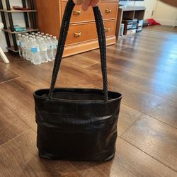 A. Giannetti genuine black medium leather handbag features a black textured exterior, gold-toned, 11"×10"×4", Clean and Great condition