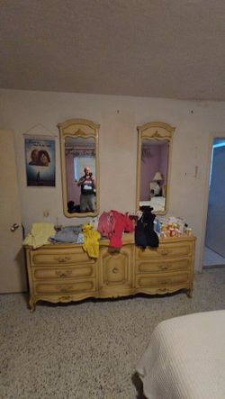 Matching dresser with mirrors and armoire