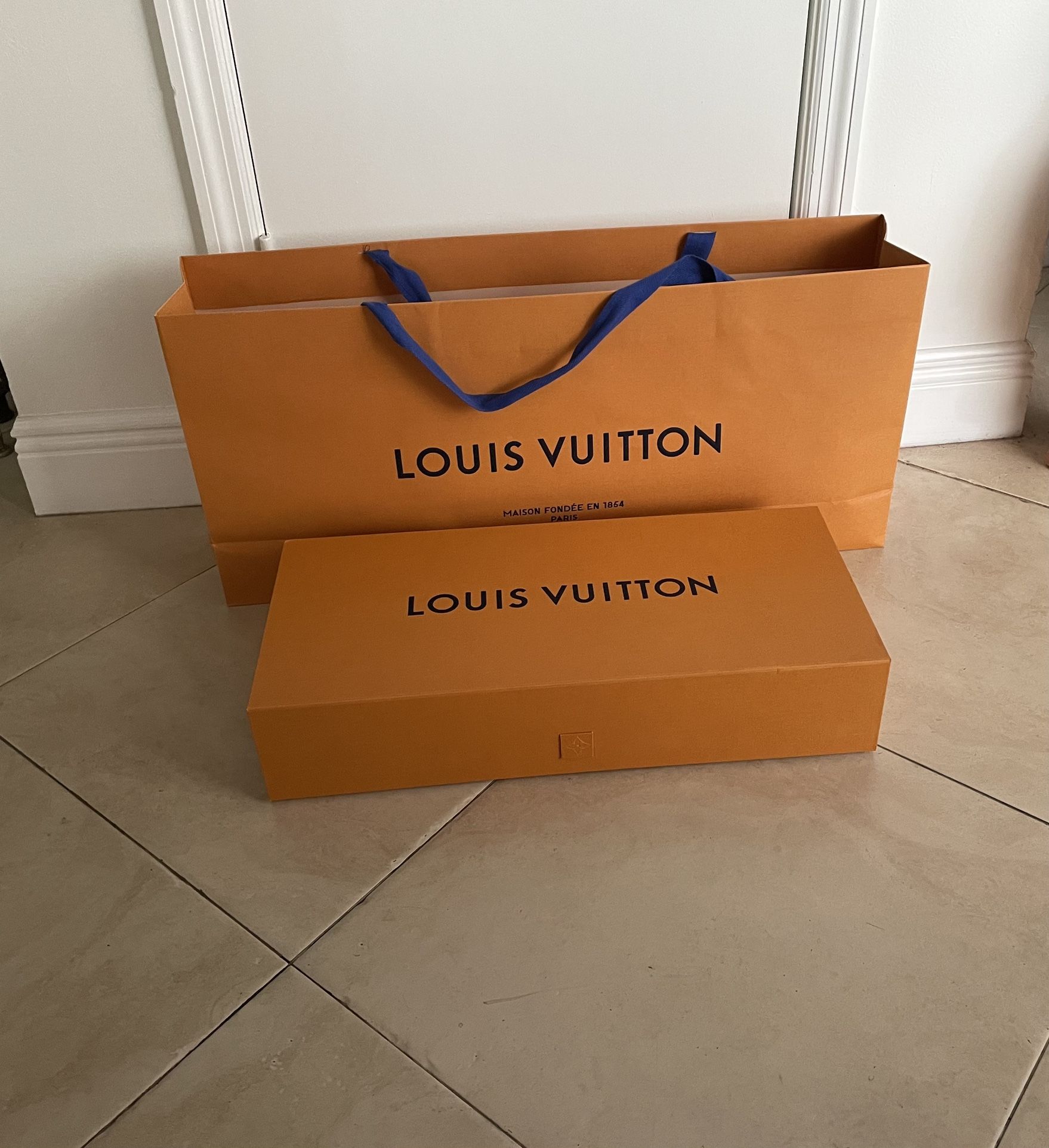 Louis Vuitton, Large Empty Box 22” W x 5.5”H x 10” D and Large Bag 30” W x 6” D