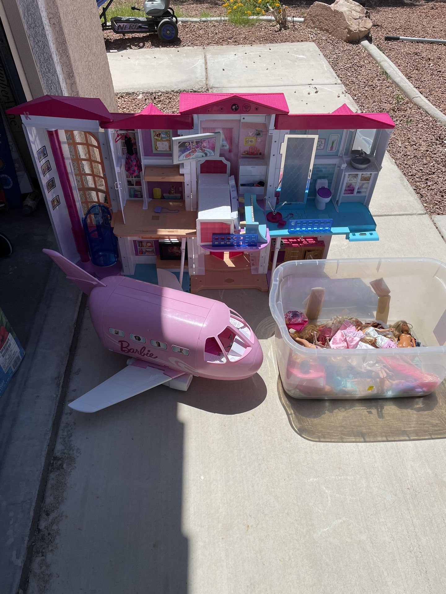Electric Barbie House With Barbies And plane for Sale in North Las