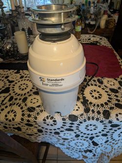 Brand new Garbage disposal with installation