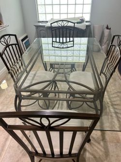 Glass top table and 4 chairs