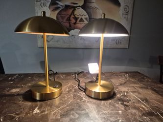Two minimalist gold stainless steal lamps