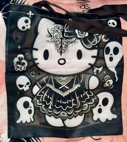 HELLO KITTY GOTHIC TRICK OR TREAT NO HOLDS! VERY STURDY, STRONG DOUBLE SIDES DESIGN