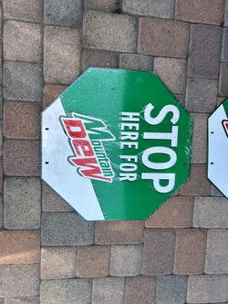 Stop Here For Mountain Dew Store Sign