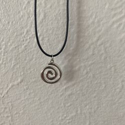 Silver spiral necklace with black cord
