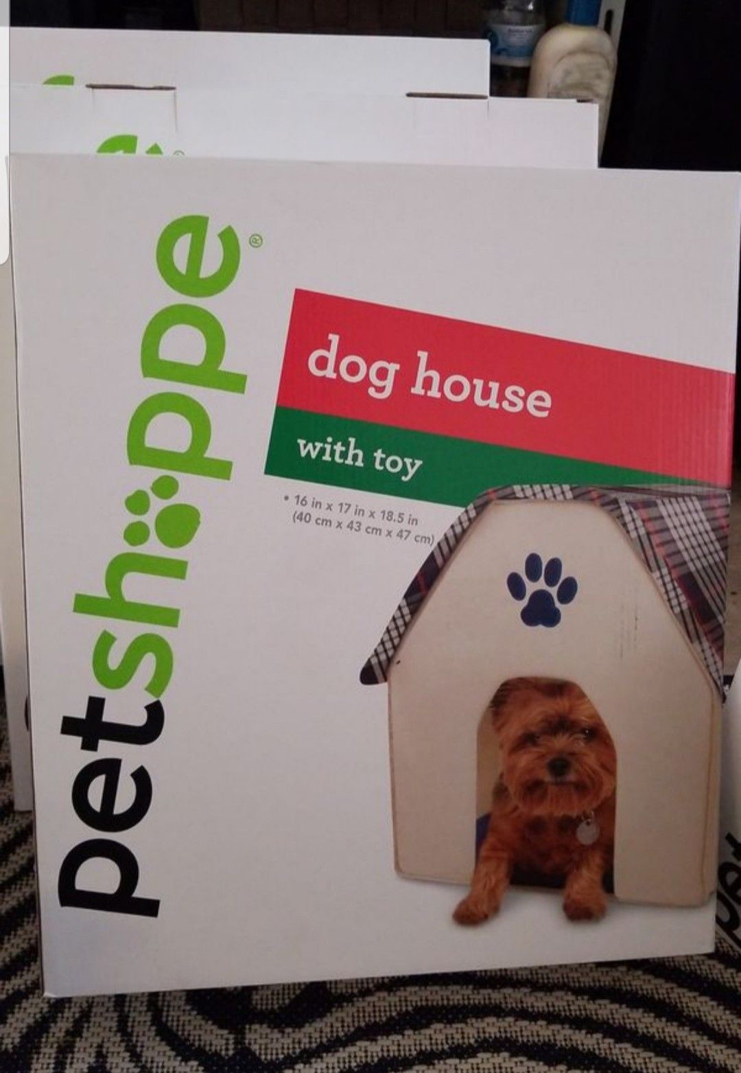 Brand new dog house comes with a toy