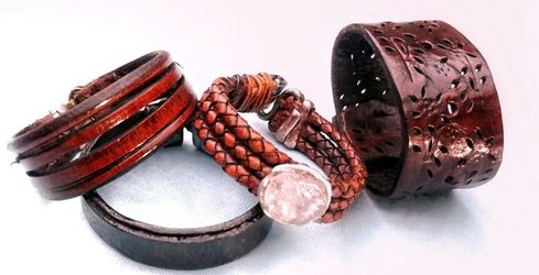 Handmade genuine leather bracelets and cuffs