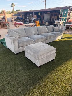 Grey Corduroy 4-Seat Sofa with Matching Ottoman - In Cleaning Process