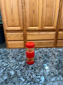 Vintage Cylindrical Green Screw Together 1950s Picnic Salt and Pepper Shakers.  Size appropriately 2 1/4 inches tall.   Preowned.  Has been on display