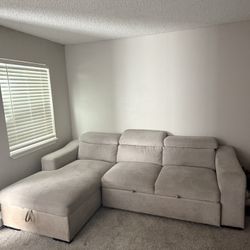 Couch With pullout Section for sleeping And Storage