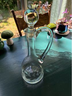 Vintage glass floral acid sketched decanter with stopper.