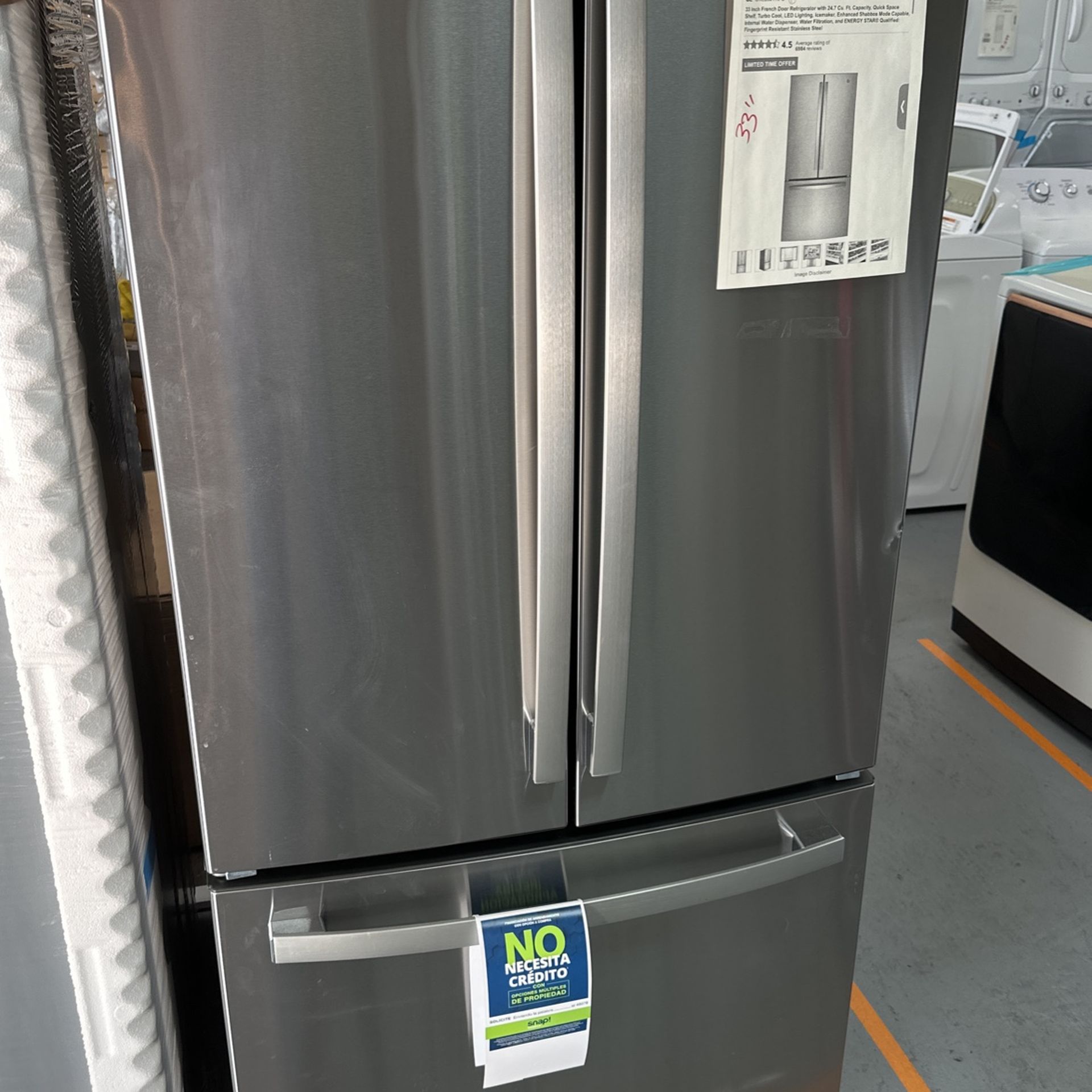 GE 33” French Door 24.7 Cu Ft With Water Dispenser Refrigerator 