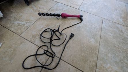 Brand new Revlon curling iron never been used