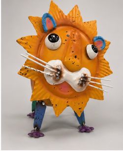 Whimsical Metal Lion Cat Sculpture