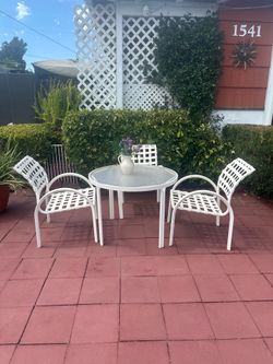 Patio table and 3 chairs