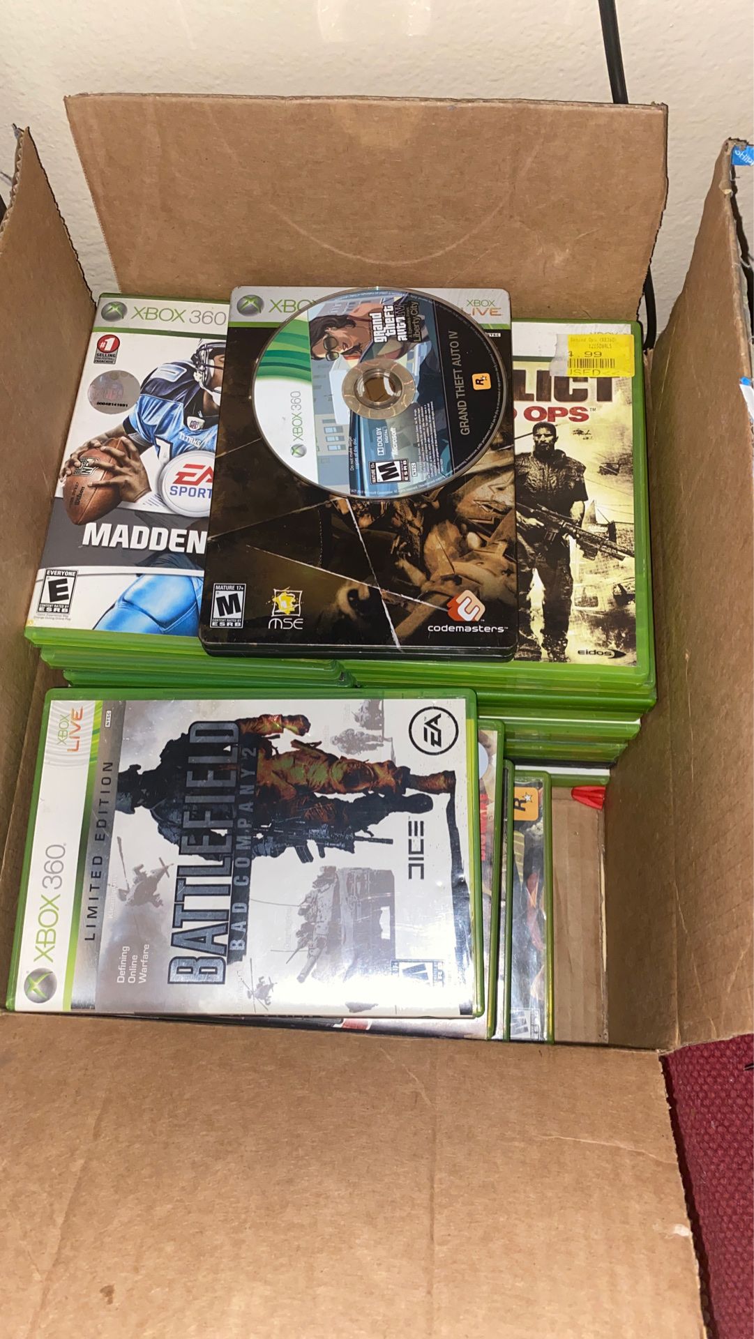 Box of Xbox 360 games