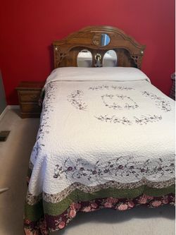 Queen bed with nightstand and mirror