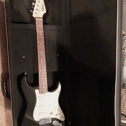Squier Strat Guitar With Roadrunner Guitar Case