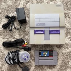 Super Nintendo Console With Super Mario World