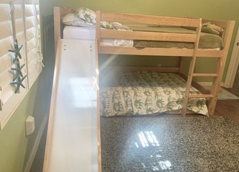 Slide bunk bed. Bottom bunk is separate, completely-can use that bed elsewhere and have loft. All wood.