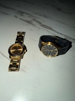 Gold movado and Nixon watches