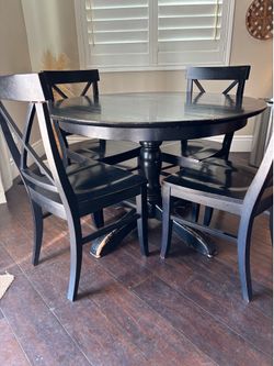 Pottery barn black round distressed table and chairs
